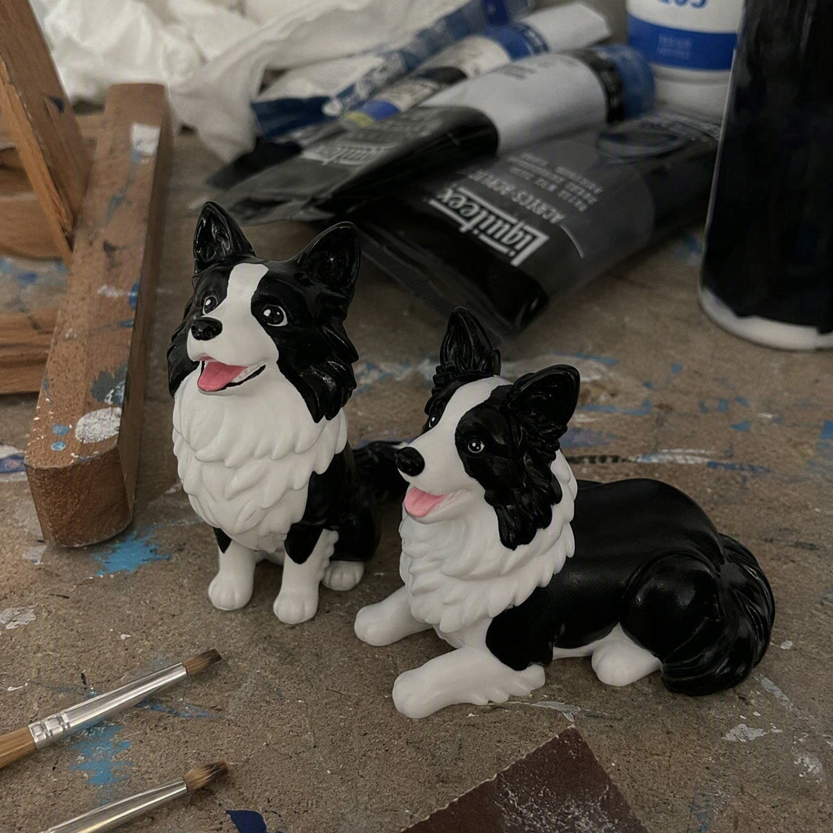 Actual studio photograph of resin border collie pieces