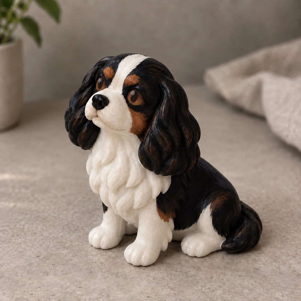 Hand-painted resin dog figurine with simple painted eyes