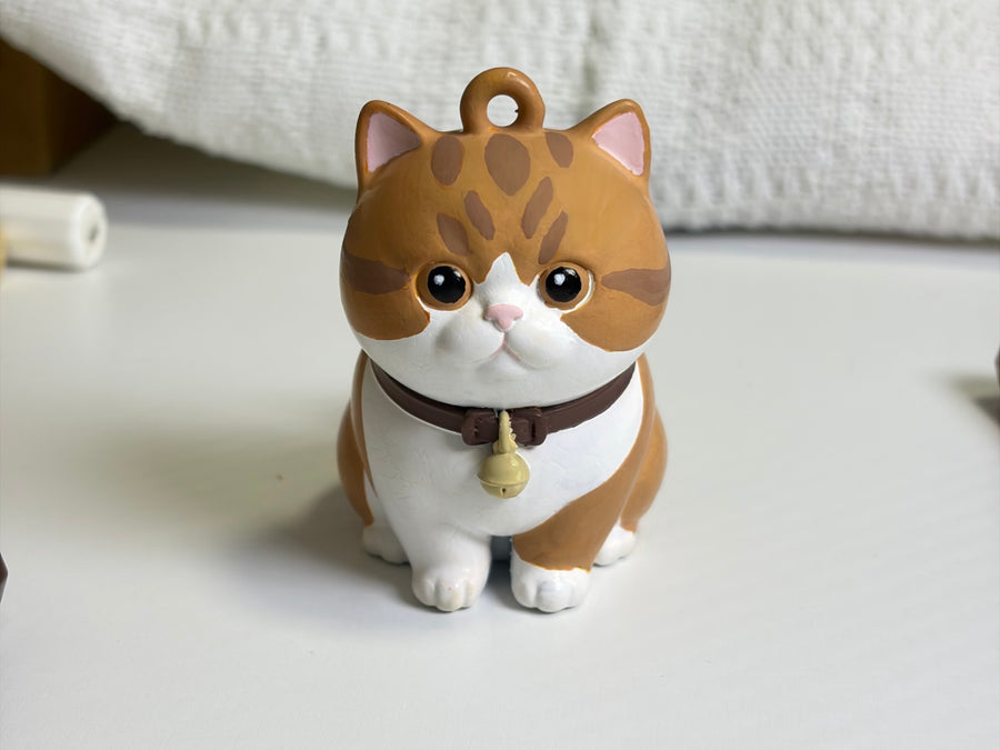 That collar charm? Hand-placed