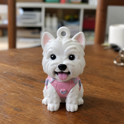Hand-painted chibi keychain figurine of the same white West Highland terrier
